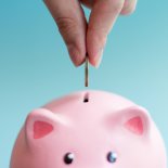 Article thumbnail: Putting coin into the piggy bank; Shutterstock ID 1769840885; Purchase Order: -