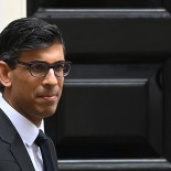 Article thumbnail: Britain's Chancellor of the Exchequer Rishi Sunak gestures outside number 10, Downing Street in central London on August 18, 2021. (Photo by Glyn KIRK / AFP) (Photo by GLYN KIRK/AFP via Getty Images)
