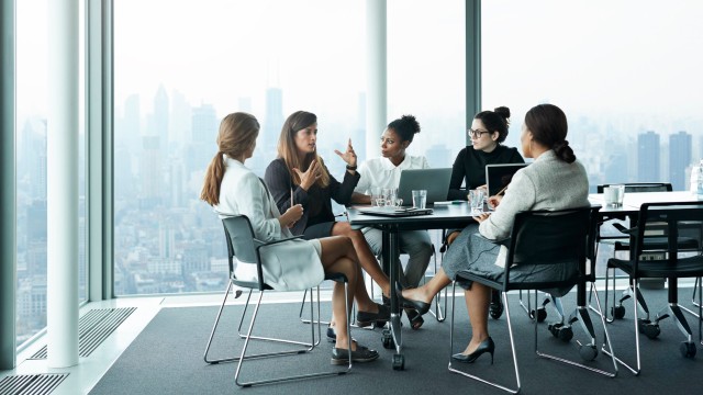 Article thumbnail: Business people in large modern meeting room