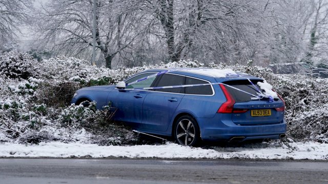 Article thumbnail: A car is left abandoned after crashing onto a roundabout in Ashford, Kent, during the icy weather. Snow and ice have swept across parts of the UK, with cold wintry conditions set to continue for days. Picture date: Monday December 12, 2022. PA Photo. Photo credit should read: Gareth Fuller/PA Wire