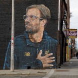 Article thumbnail: A mural of Liverpool FC manager Jurgen Klopp by the street artist "Akse" in Liverpool's Baltic Triangle (Photo: Tom Jenkins/Getty Images)