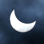 Article thumbnail: A general view shows a partial solar eclipse in Denpasar, on Indonesia's resort island of Bali on April 20, 2023. (Photo by SONNY TUMBELAKA / AFP) (Photo by SONNY TUMBELAKA/AFP via Getty Images)