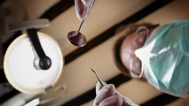 Article thumbnail: The British Dental Association says patients are choosing to have teeth removed because it is cheaper than trying to save them. (Photo by Peter Macdiarmid/Getty Images)
