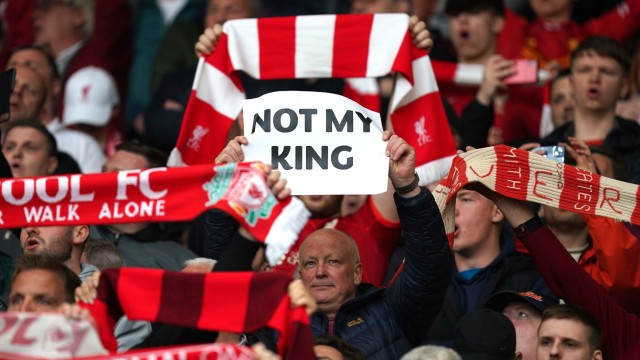 Article thumbnail: Liverpool fans hold up a sign saying 'Not My King' while booing the national anthem before the Premier League match at Anfield, Liverpool. Picture date: Saturday May 6, 2023. PA Photo. See PA Story SOCCER Liverpool. Photo credit should read: Mike Egerton/PA Wire. RESTRICTIONS: EDITORIAL USE ONLY No use with unauthorised audio, video, data, fixture lists, club/league logos or "live" services. Online in-match use limited to 120 images, no video emulation. No use in betting, games or single club/league/player publications.
