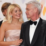 Article thumbnail: LONDON, ENGLAND - JANUARY 28: Holly Willoughby and Phillip Schofield, accepting the Live Magazine Show award for "This Morning", pose in the winners room at the National Television Awards 2020 at The O2 Arena on January 28, 2020 in London, England. (Photo by David M. Benett/Dave Benett/Getty Images)