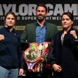 Article thumbnail: Dublin , Ireland - 20 March 2023; Katie Taylor, left, and Chantelle Cameron face off with promoter Eddie Hearn, centre, after a media conference, held at the Mansion House in Dublin, ahead of their undisputed super lightweight championship fight on May 20th at the 3Arena in Dublin. (Photo By David Fitzgerald/Sportsfile via Getty Images)