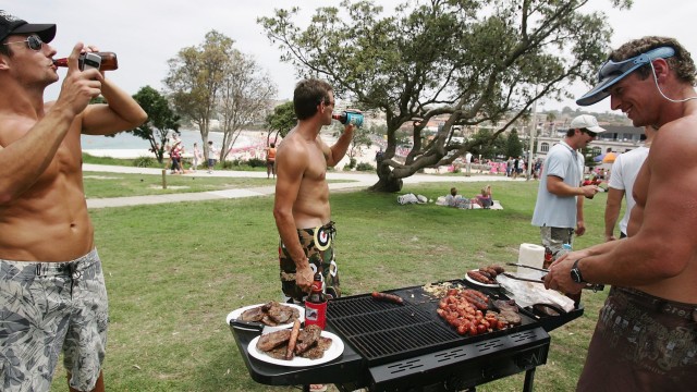 Article thumbnail: SYDNEY, NSW - JANUARY 26: Revellers have a barbeque on Coogee beach on Australia Day January 26, 2006 in Sydney, Australia. Australians all over the country will today celebrate Australia Day. (Photo by Ian Waldie/Getty Images)