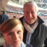 Article thumbnail: Simon Kelner and his daughter at a football stadium. They often watch Man City play together