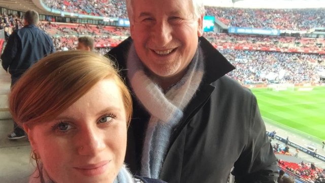 Article thumbnail: Simon Kelner and his daughter at a football stadium. They often watch Man City play together