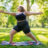 Article thumbnail: Young woman practicing yoga doing Virabhadrasana II or Warrior 2 Pose outdoors in park