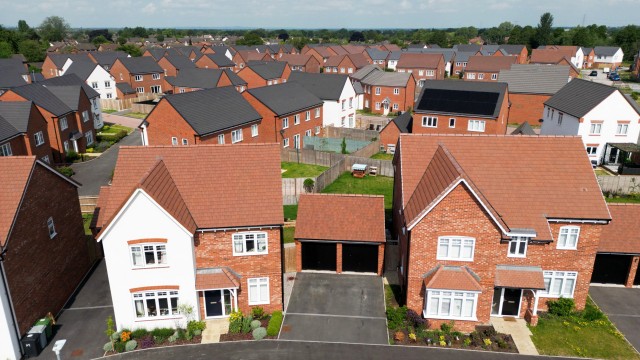 Article thumbnail: CREWE, ENGLAND - JUNE 22: An aerial view of new houses are seen on a construction development on June 22, 2023 in Crewe, England. The Bank of England has increased the base rate to 5% today, the highest rate since 2008. (Photo by Christopher Furlong/Getty Images)
