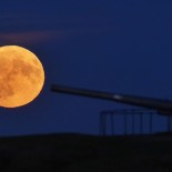 Article thumbnail: The Full Buck supermoon rises over over the canon at Blyth Battery in Northumberland. The July supermoon is arriving to its closest point to Earth at 224,895 miles (361,934km) - around 13,959 miles (22,466km) closer than usual. It appears 5.8 per cent bigger and 12.8 per cent brighter than an ordinary full moon. Picture date: Sunday July 2, 2023. PA Photo. See PA story SCIENCE Supermoon. Photo credit should read: Owen Humphreys/PA Wire