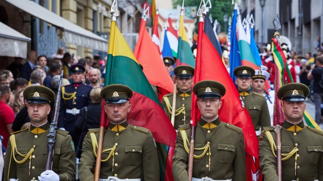 Article thumbnail: VILNIUS, LITHUANIA - JULY 6: Lithuanian soldiers march with the flags of NATO member countries during the celebration of Lithuanian Statehood Day on July 6, 2023 in Vilnius, Lithuania. (Photo by Oleg Nikishin/Getty Images)